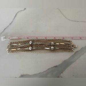 Vintage Kramer bracelet. Gold multi strand with grayish pearls.